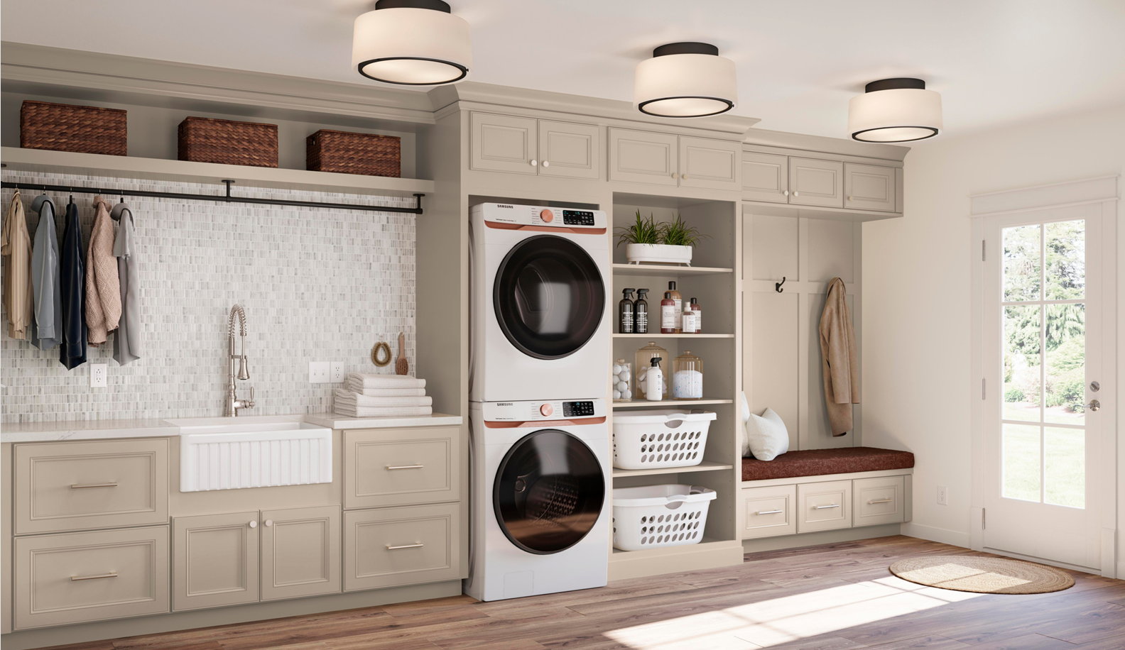 Laundry room cabinetry with a stacked washer and dryer